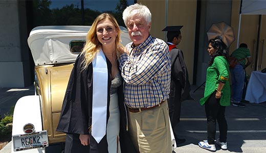 Tech Promise Scholar Heather Johnston stands with her financial aid advisor on her graduation day.